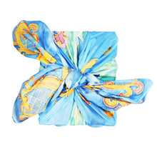 Environmentally friendly gift wrapping in vintage silk scarf
