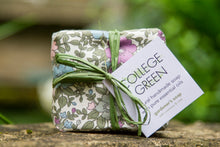 Original bar of College Green gardener's soap wrapped in floral cloth tied with green twine