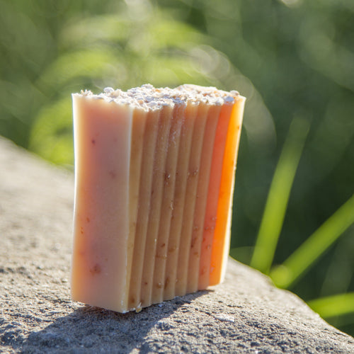 Unwrapped bar of College Green Lemongrass, Ginger and Oat beer soap
